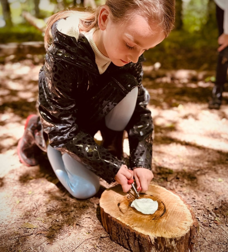 Student partaking in a forest school lesson