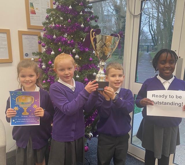 Pupils at Leigh Academy Tree Tops are pictured celebrating and smiling for the camera, as they announce that their school is read to be judged 'Outstanding' by Ofsted.