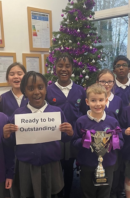 Pupils at Leigh Academy Tree Tops are pictured celebrating and smiling for the camera, as they announce that their school is read to be judged 'Outstanding' by Ofsted.